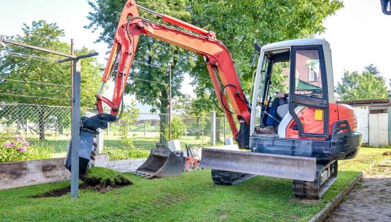 excavator-working-on-the-lawn